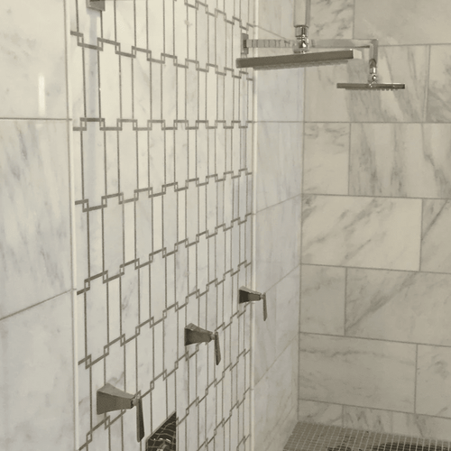 beautiful marble-walled shower in Carol Stream, IL from Superb Carpets, Inc.