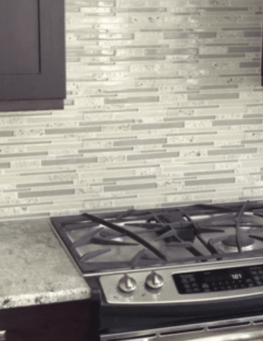 Tile backsplash and beautiful countertops in Wheaton, IL from Superb Carpets, Inc.