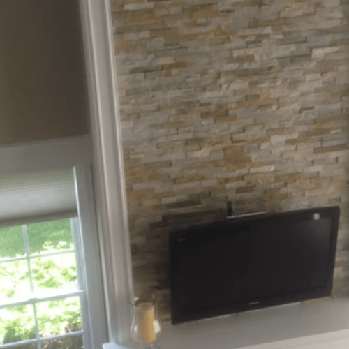 Stone wall TV mount in Carol Stream, IL from Superb Carpets, Inc.